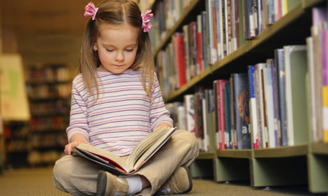 Young-girl-reading-in-lib-001
